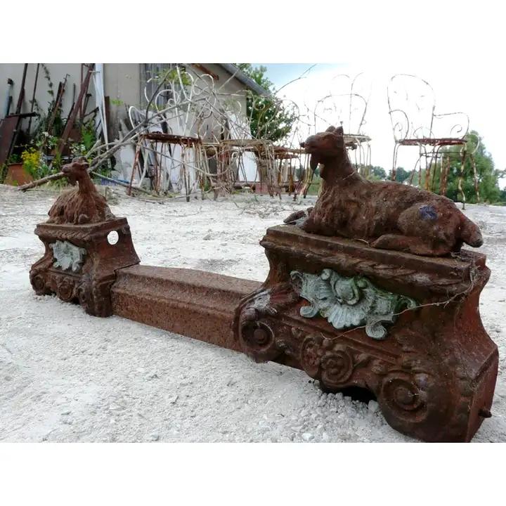 Paire de chenets en fonte et bronze