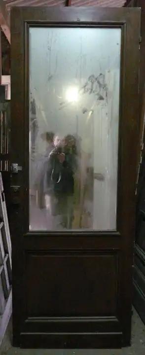 Porte de communication vitrée d'un mirroire
