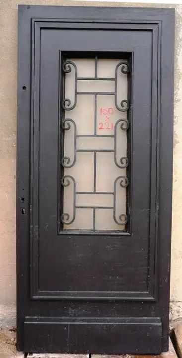 Porte d'entrée en bois et fer