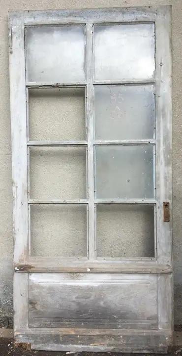 Ancienne porte d'entrée vitrée