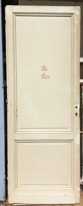Ancienne porte d'intérieure en bois à deux panneaux