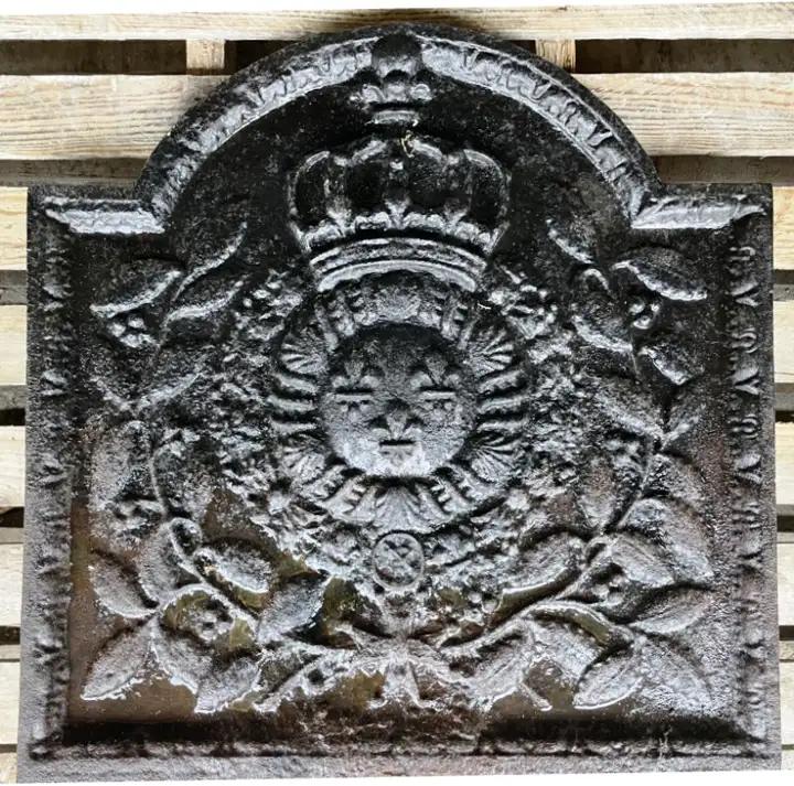 Ancienne plaque foyère en fonte de fer