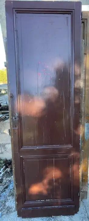 Ancienne porte de communication en bois à deux panneaux