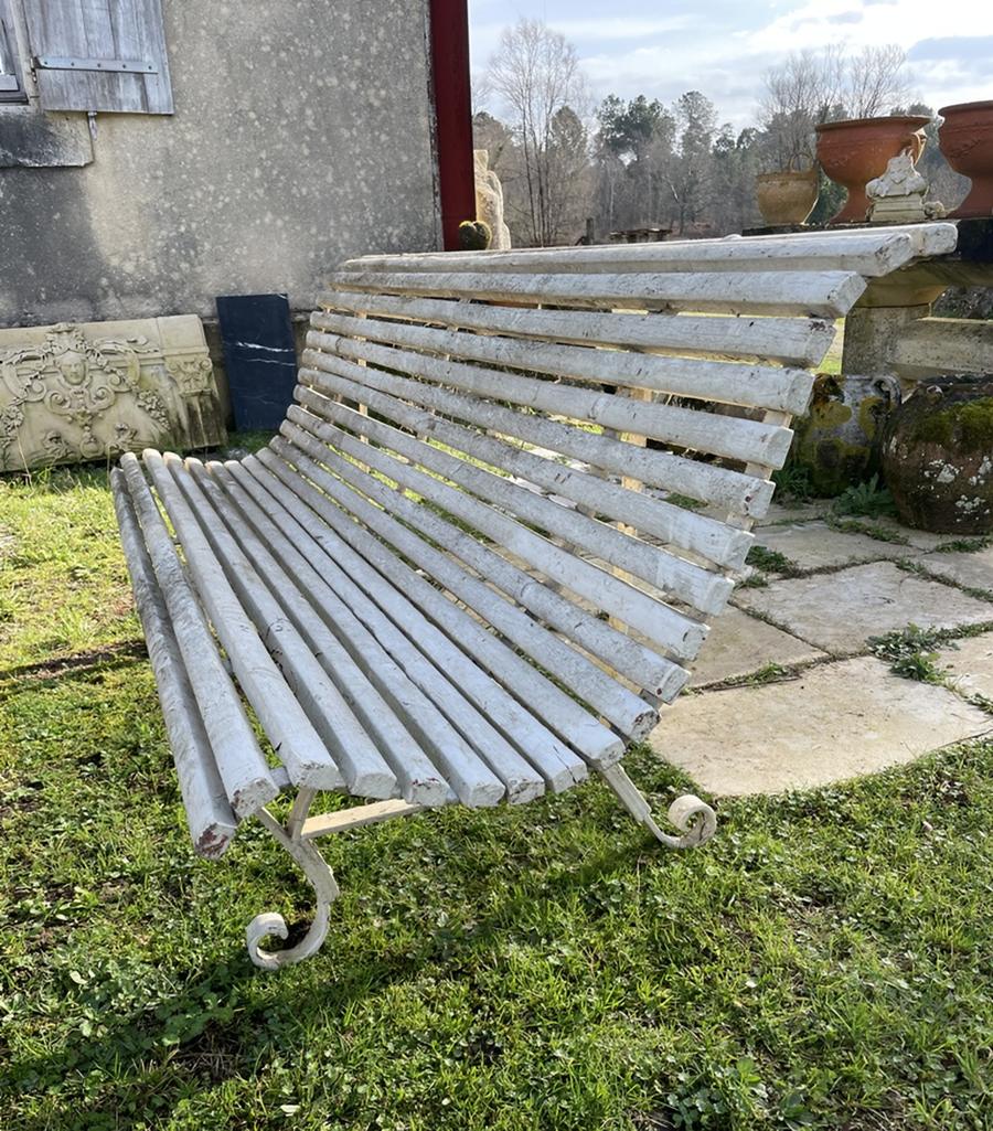 Ancien banc de jardin à deux pieds en fer