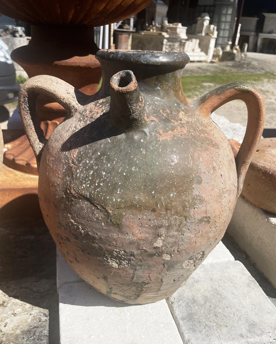 Ancienne poterie campagnarde en terre cuite vernissée