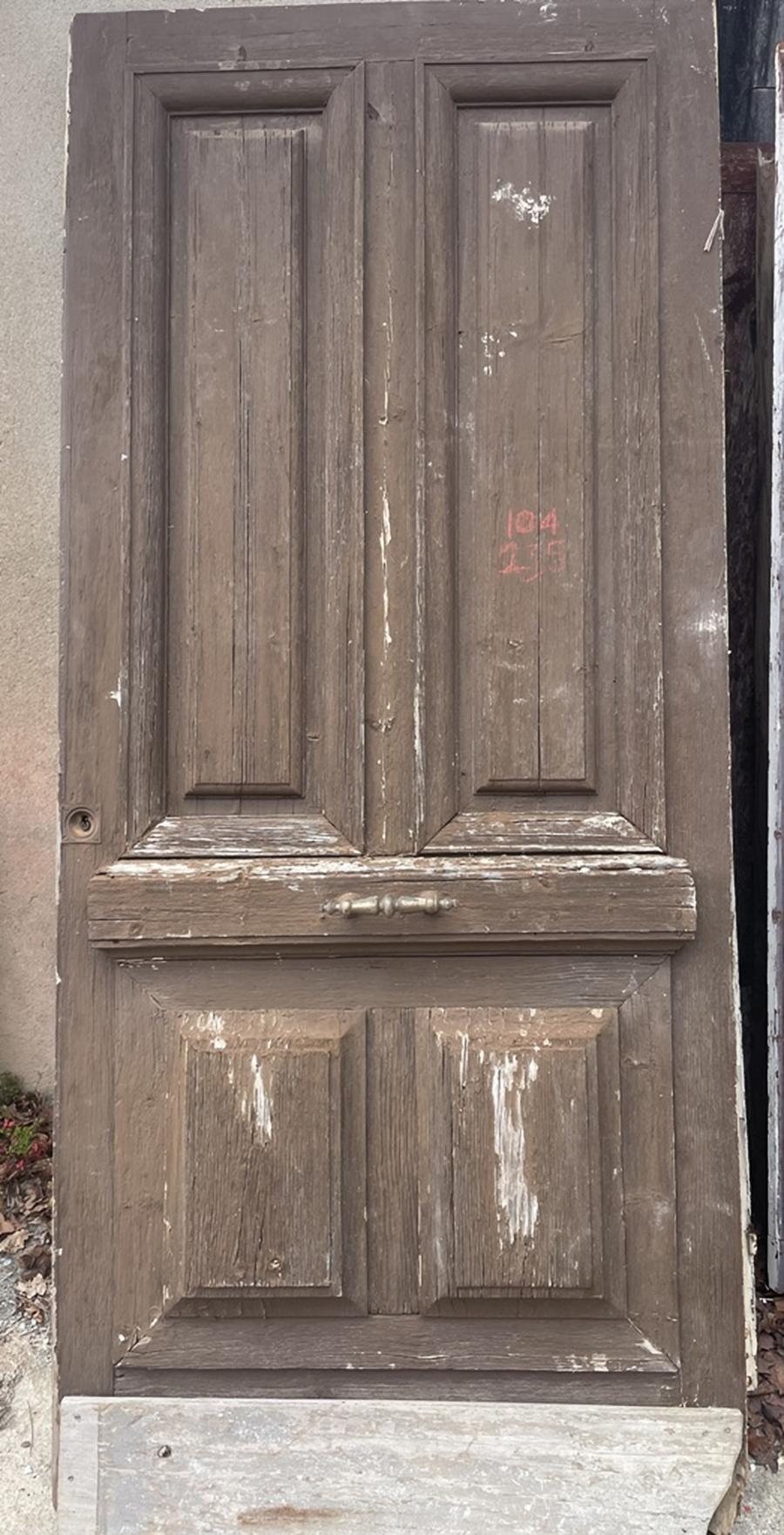 Porte d'entrée a panneaux pointe de diamant
